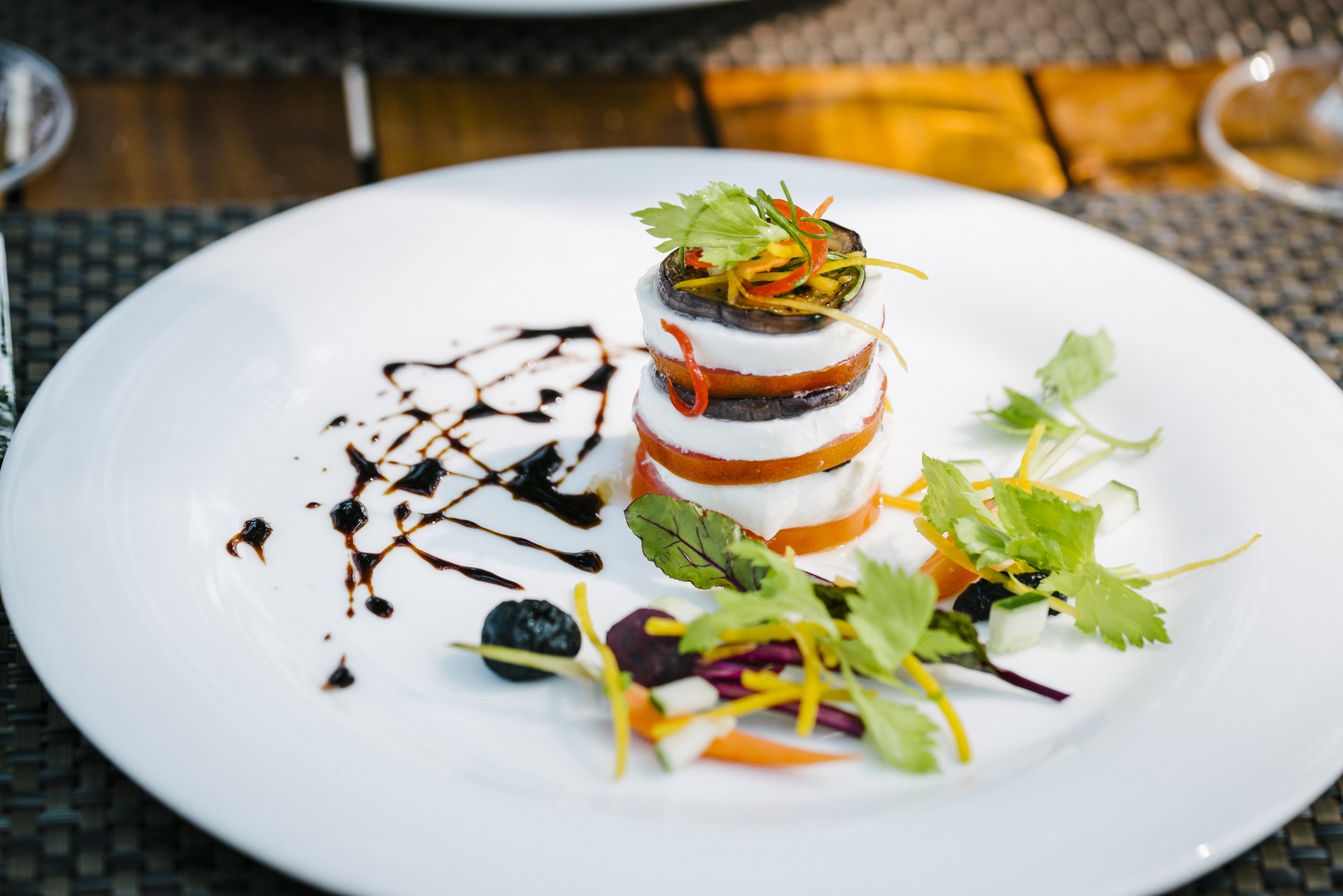 Caprese di Melanzane — buffalo mozzarella, vine-ripened tomato, grilled eggplant, aged balsamic